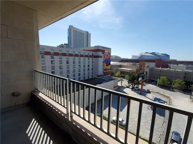a view of balcony with furniture