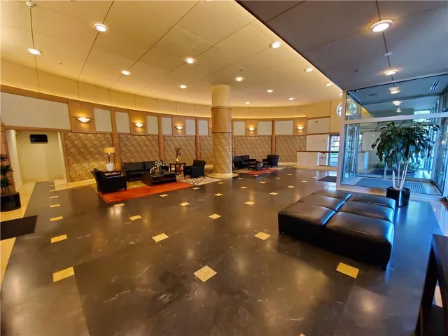 a gym room with lots of gym equipment