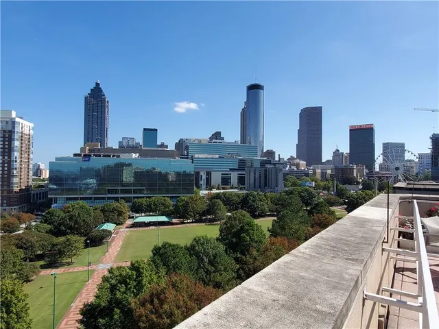 a view of a city with tall buildings