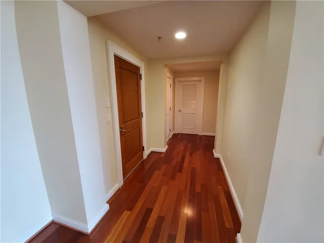 a view of wooden floor in a gallery