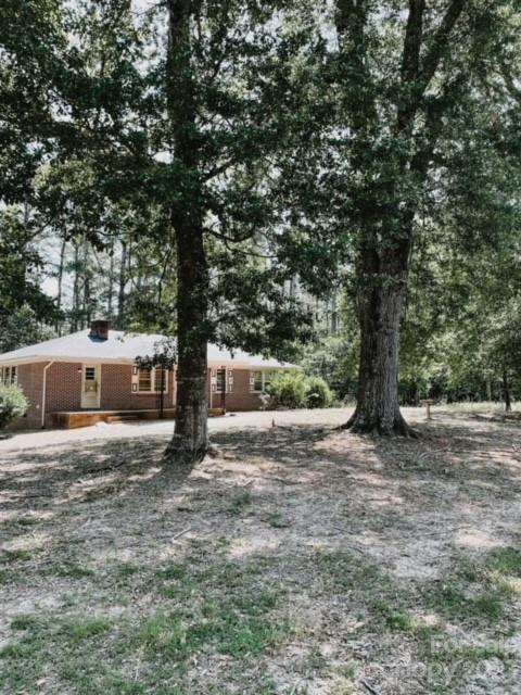 1532 Center Road Chester, SC 29706 - Photo 1 of 40 a view of a yard with large tree