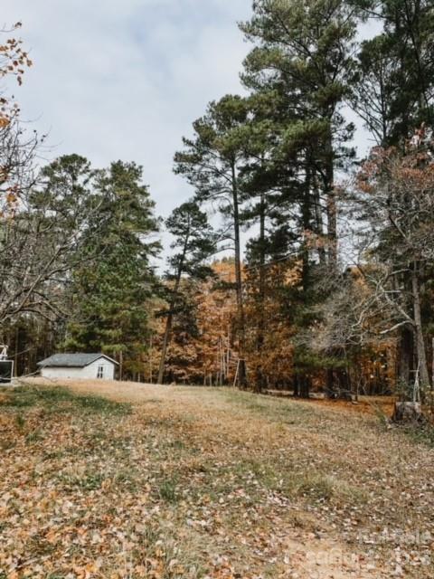 1532 Center Road Chester, SC 29706 - Photo 2 of 40 a view of dirt yard with a tree