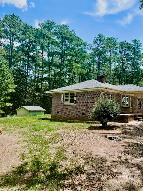 1532 Center Road Chester, SC 29706 - Photo 7 of 40 a view of a house with a yard