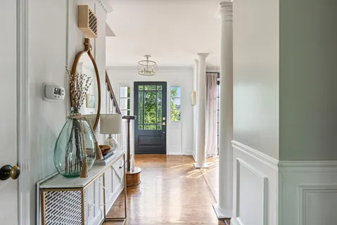 a view of an entryway with a front door