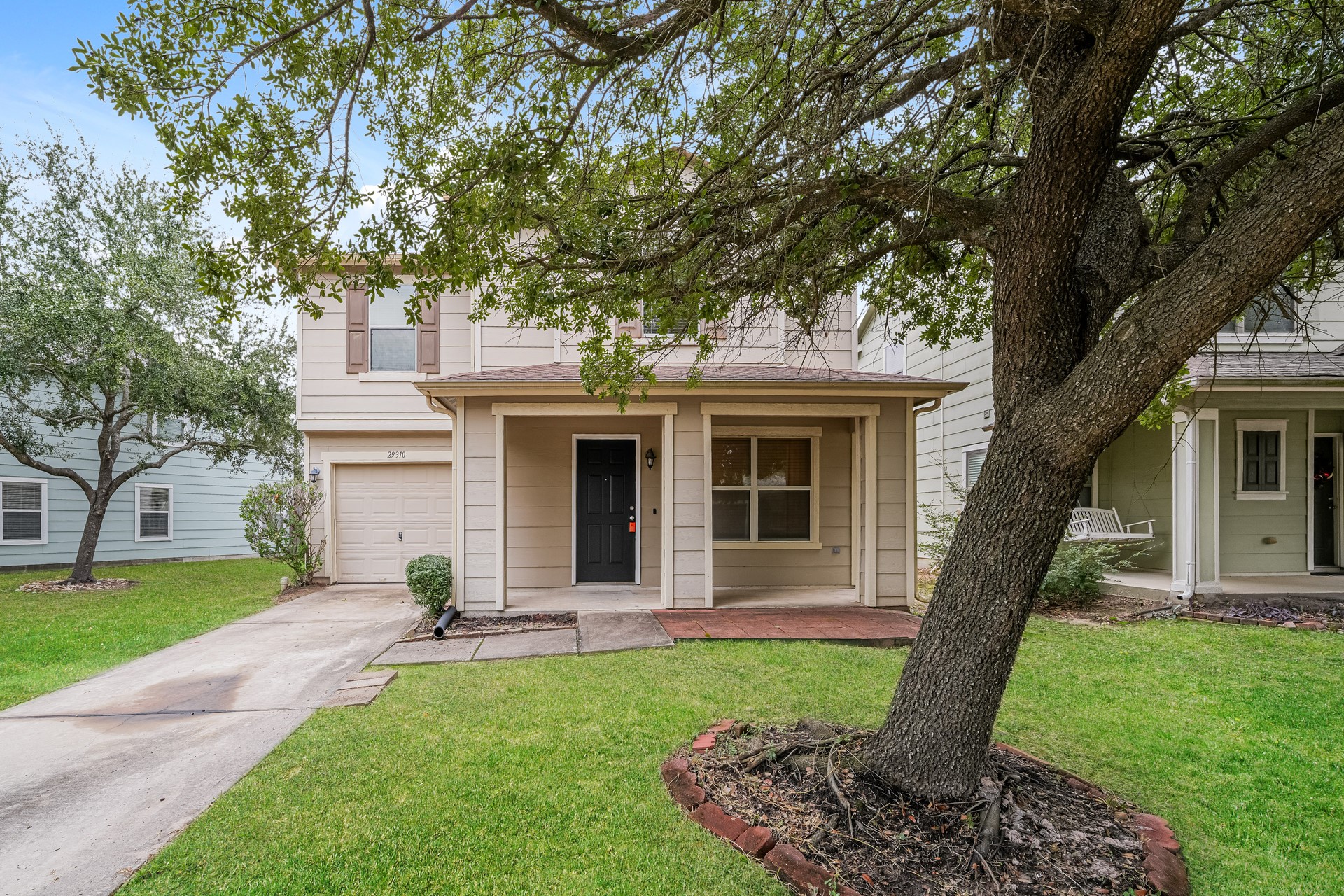 29310 Hickory Terrace Drive Spring, TX 77386 - Photo 1 of 18 a front view of a house with garden