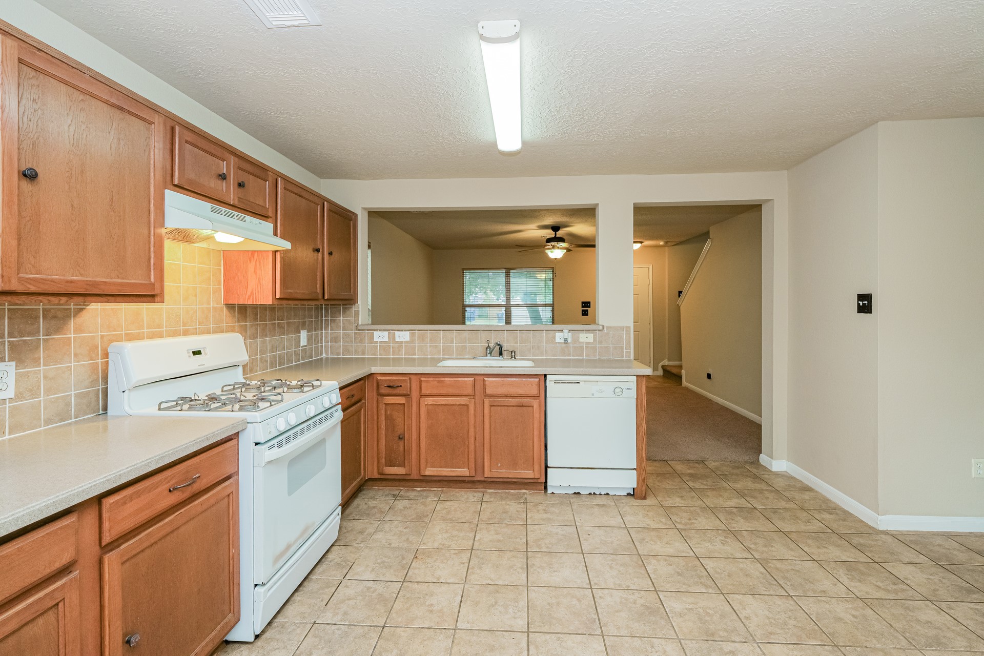 29310 Hickory Terrace Drive Spring, TX 77386 - Photo 10 of 18 a kitchen with a sink cabinets and window