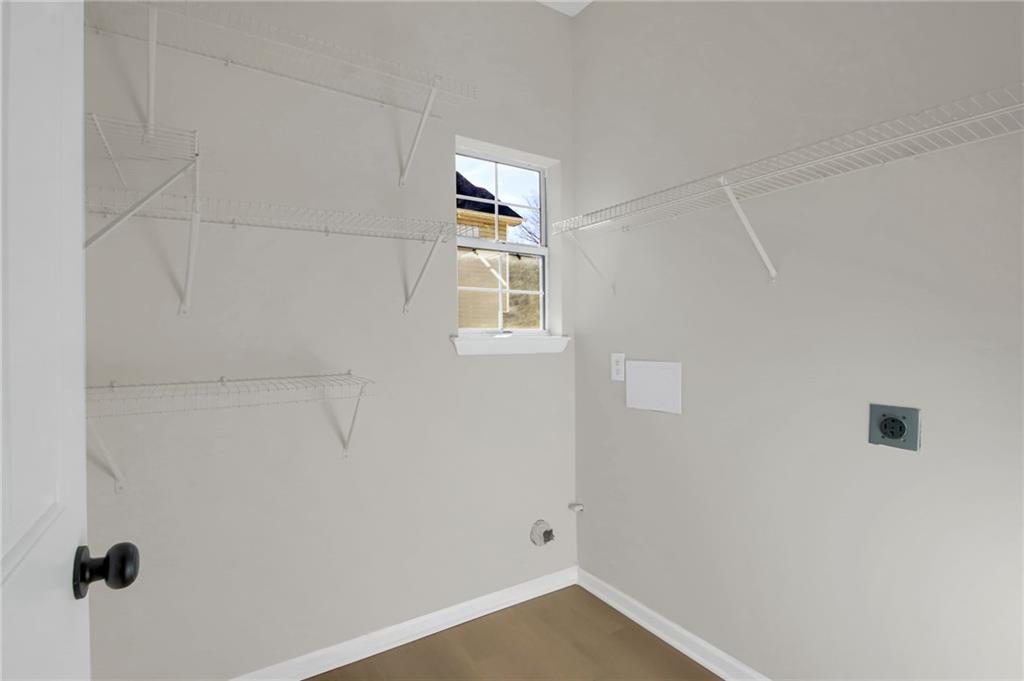 6566 Shaffers Way Lithonia, GA 30058 - Photo 15 of 31 a view of an empty room with a window