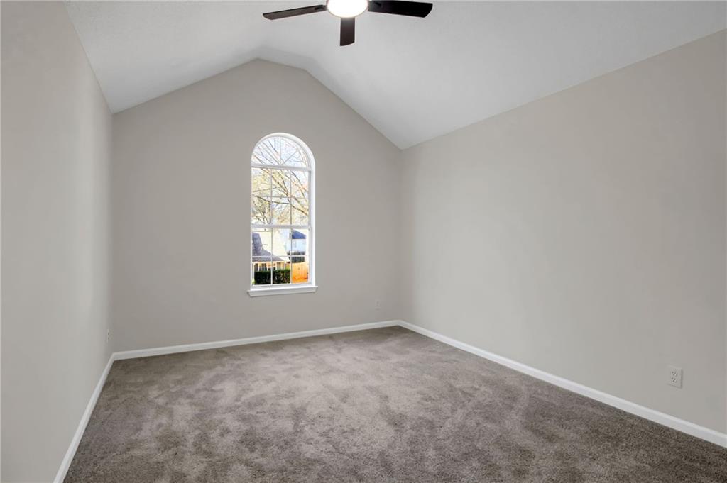 6566 Shaffers Way Lithonia, GA 30058 - Photo 24 of 31 an empty room with a window