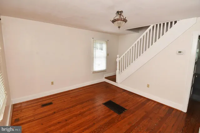 a view of entryway with wooden floor