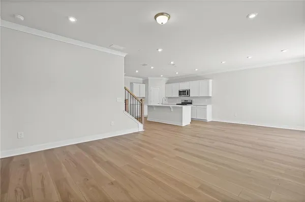 a view of kitchen with wooden floor