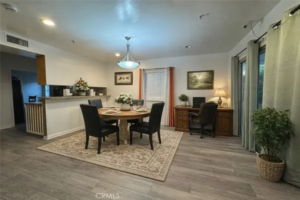 a view of a dining room with furniture
