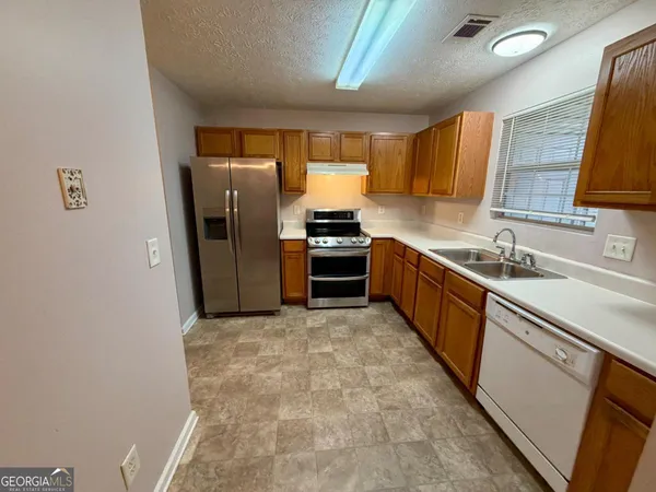 $1,565 | 5583 Windfall Lane, Lithonia, GA 30058