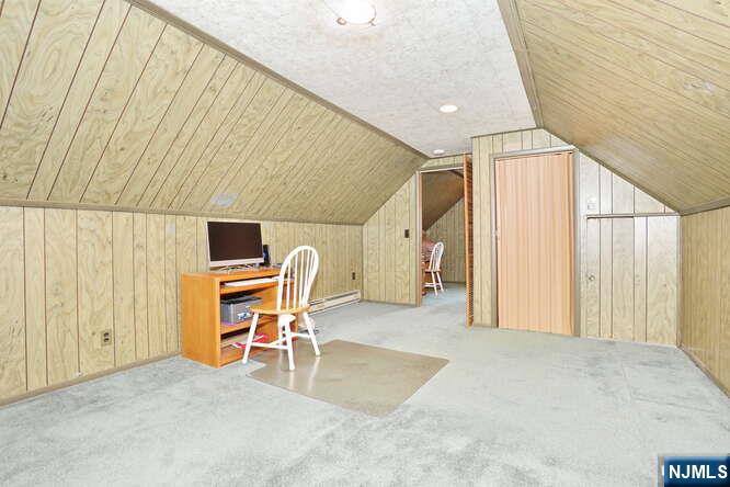 22-09 Arcadia Road Fair Lawn, NJ 07410 - Photo 14 of 28 a view of a livingroom with furniture and window