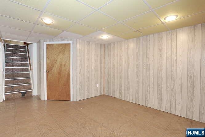 22-09 Arcadia Road Fair Lawn, NJ 07410 - Photo 18 of 28 a view of an empty room with a window