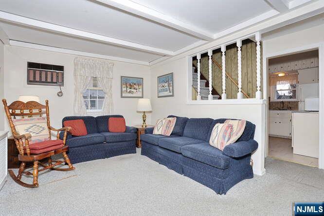 22-09 Arcadia Road Fair Lawn, NJ 07410 - Photo 3 of 28 a living room with furniture and a window