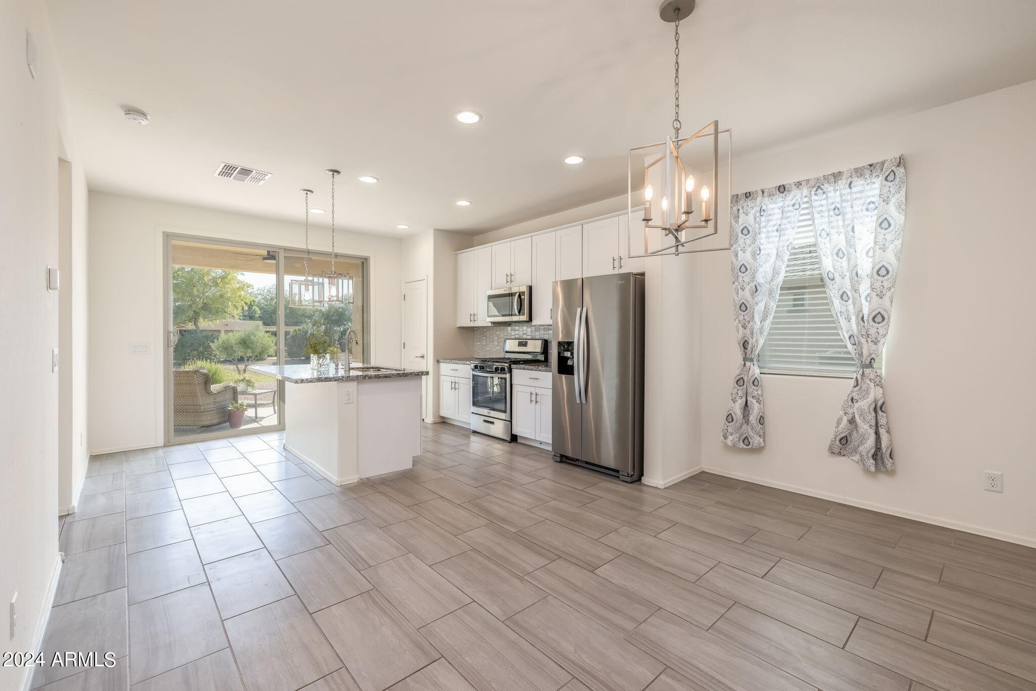20810 North Gardenia Road Maricopa, AZ 85138 - Photo 16 of 42 Flexible dining space