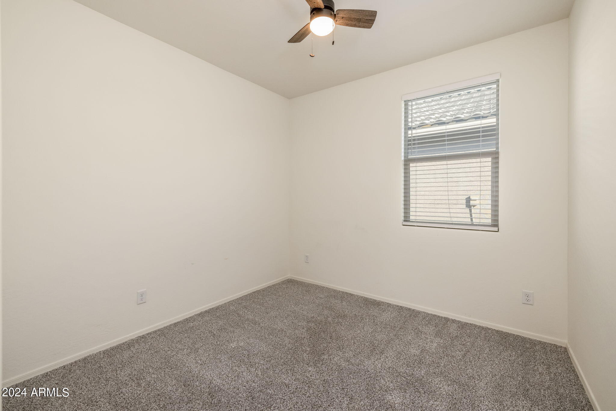 20810 North Gardenia Road Maricopa, AZ 85138 - Photo 23 of 42 Bedroom 3 with blinds and fan