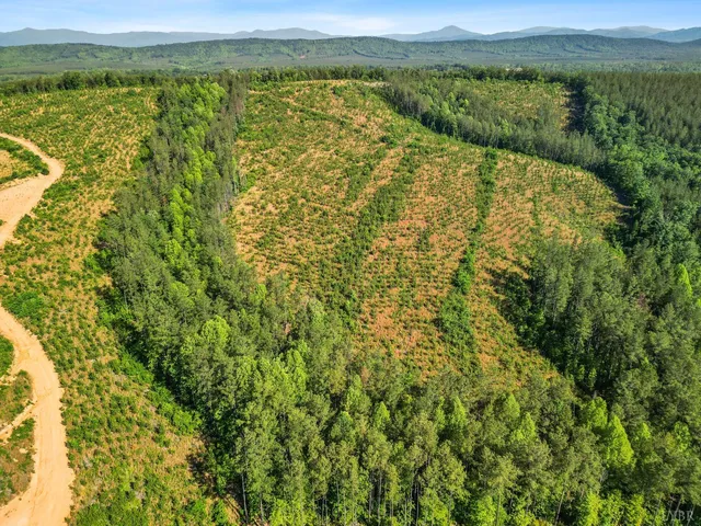 a view of a field with an outdoor space