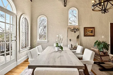 a kitchen with stainless steel appliances a sink and cabinets