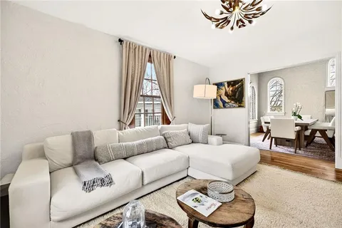 a kitchen with a stove a sink and a refrigerator