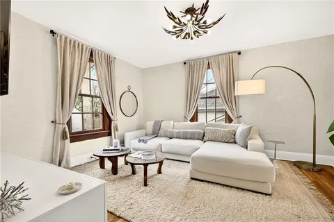 a kitchen with granite countertop a stove and a sink