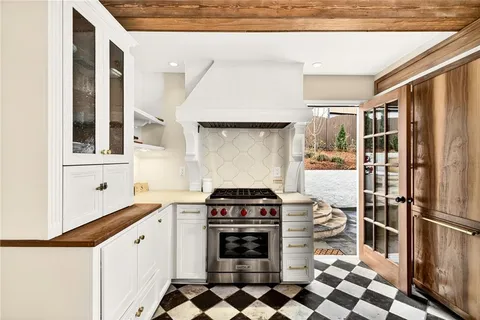 a bedroom with furniture and a wooden floor