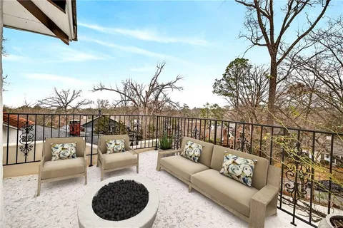 a view of a outdoor seating area with furniture