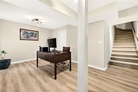 a view of a wrought iron fences in front of house