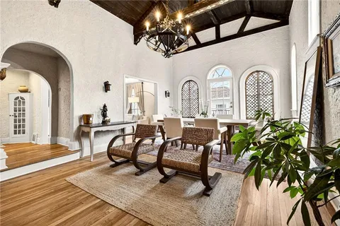 a bedroom with a bed and a fireplace