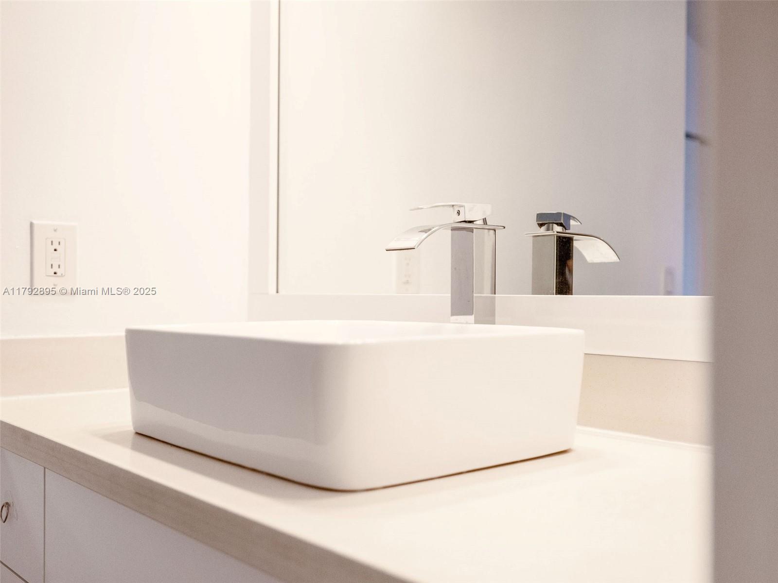 1225 Seagrape Circle Weston, FL 33326 - Photo 27 of 61 a white bath tub sitting in a bathroom