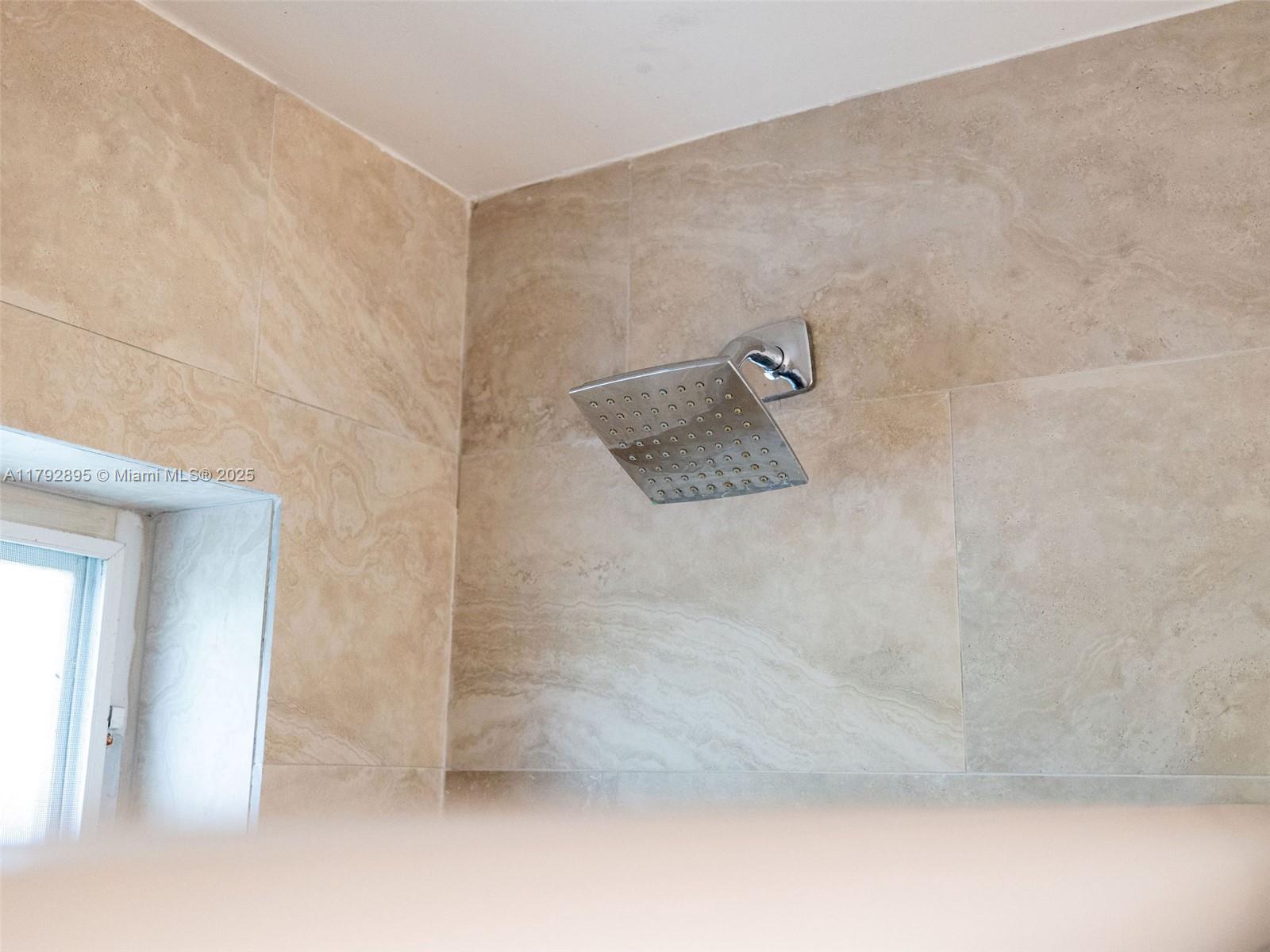 1225 Seagrape Circle Weston, FL 33326 - Photo 38 of 61 a bathroom with a shower