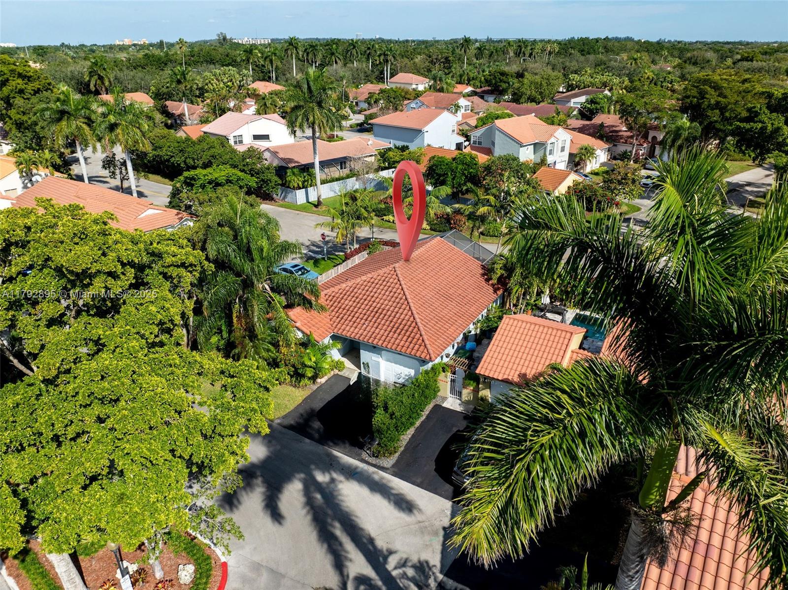 1225 Seagrape Circle Weston, FL 33326 - Photo 53 of 61 an aerial view of residential houses with outdoor space and trees