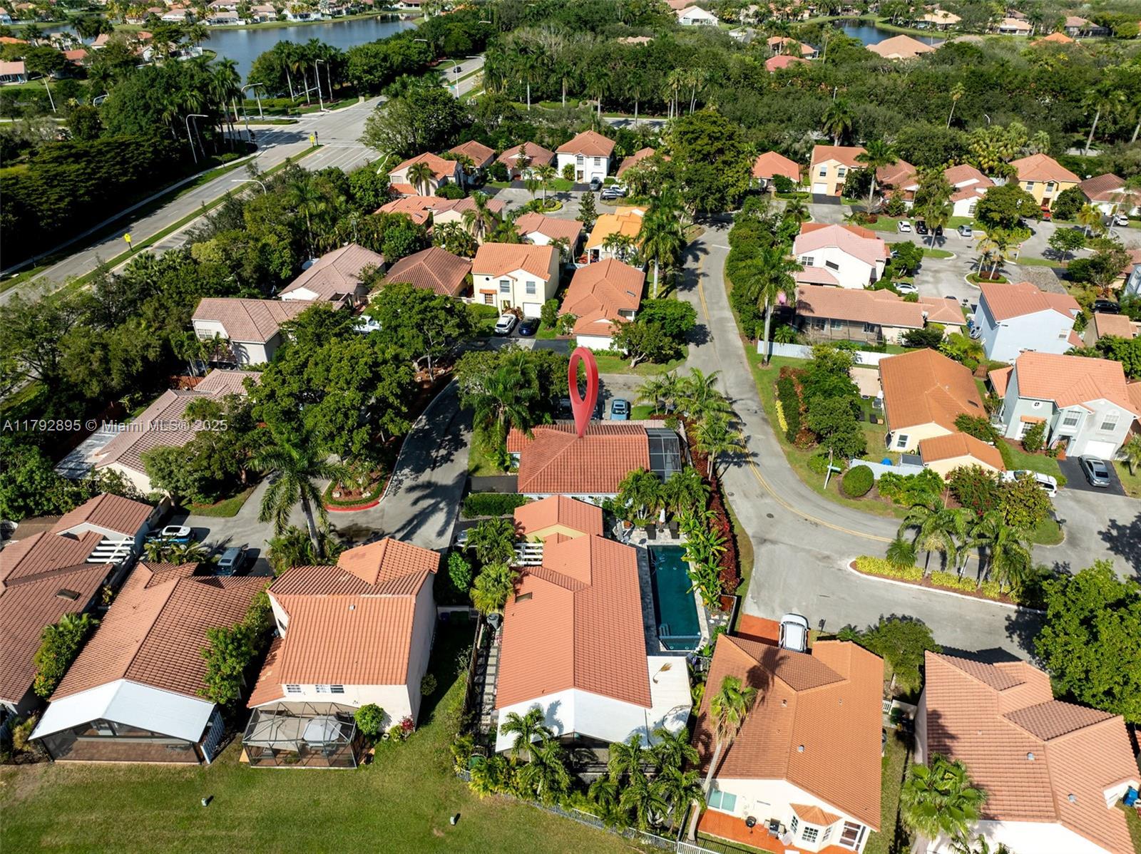 1225 Seagrape Circle Weston, FL 33326 - Photo 55 of 61 an aerial view of residential houses with outdoor space and street view