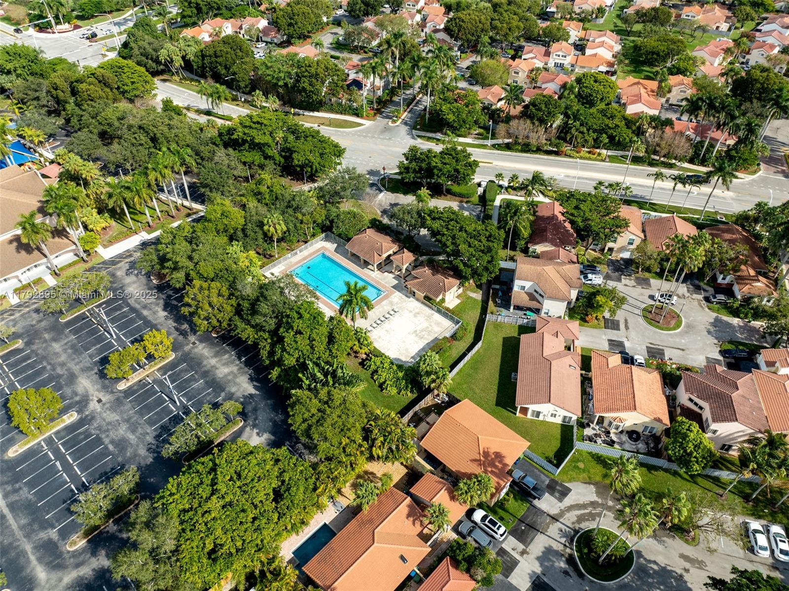 1225 Seagrape Circle Weston, FL 33326 - Photo 58 of 61 an aerial view of residential houses with outdoor space