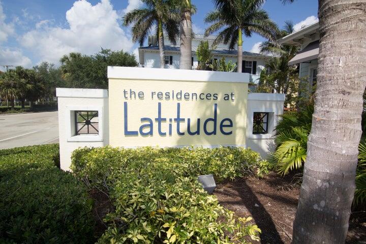 3120 East Latitude Circle, Unit 309 Delray Beach, FL 33483 - Photo 1 of 32 a sign on the side of a building