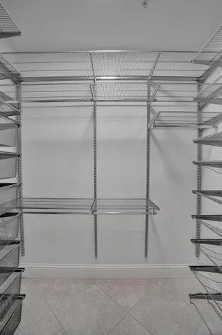 a view of a room with racks on the wall