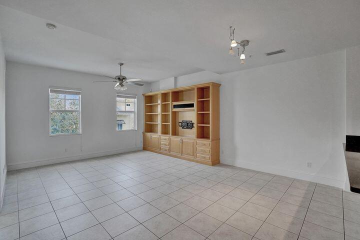 3120 East Latitude Circle, Unit 309 Delray Beach, FL 33483 - Photo 10 of 32 a view of an empty room with a window