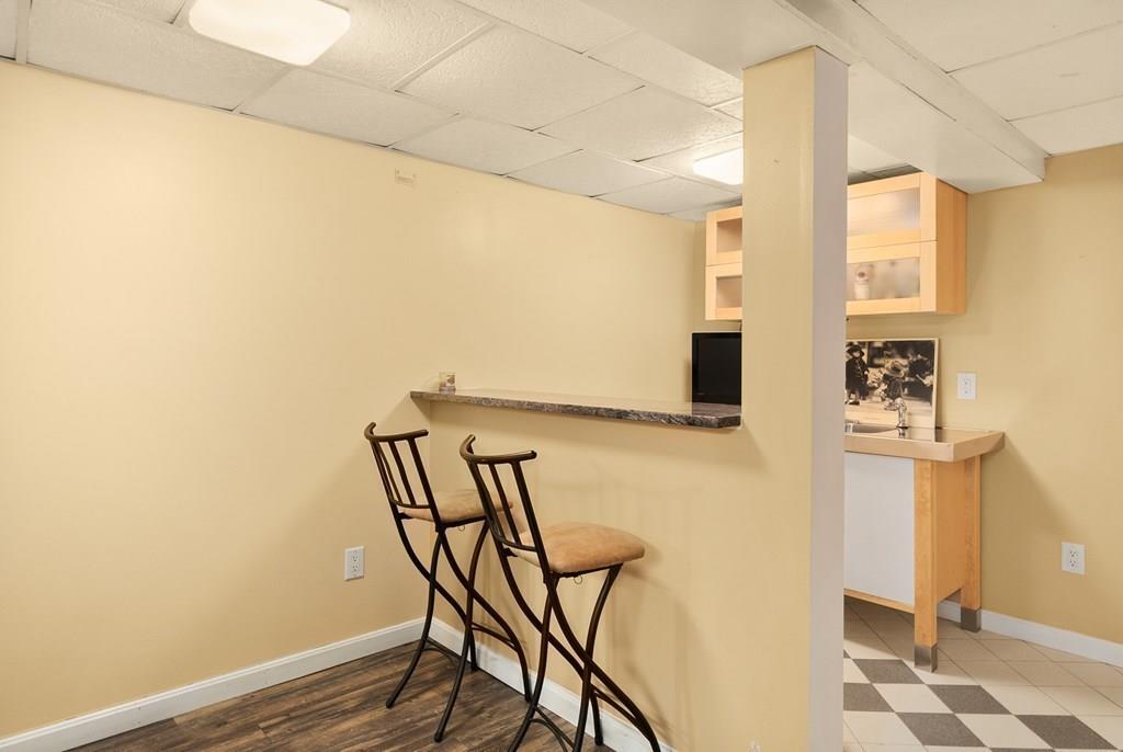 39 Williams Road Ashland, MA 01721 - Photo 18 of 30 a view of a room with wooden floor and furniture