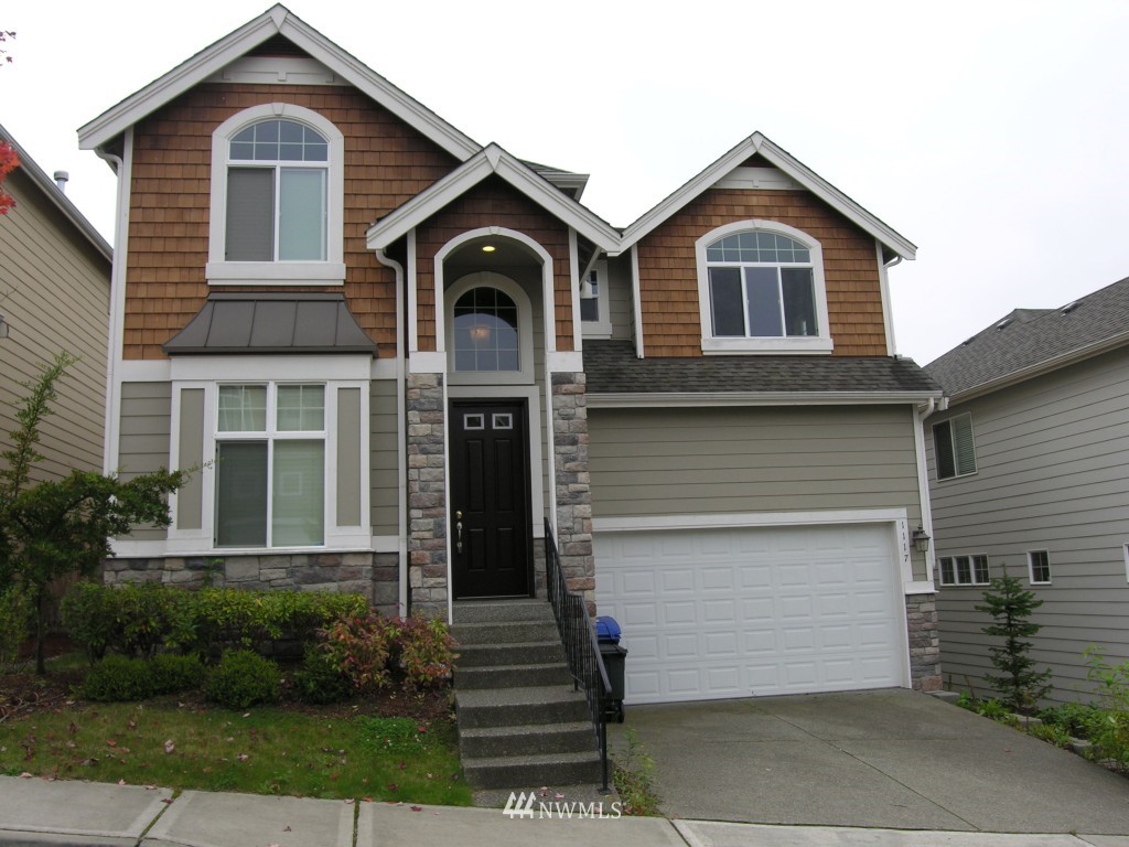 1117 South 36th Street Renton, WA 98055 - Photo 1 of 1 a front view of a house with a yard