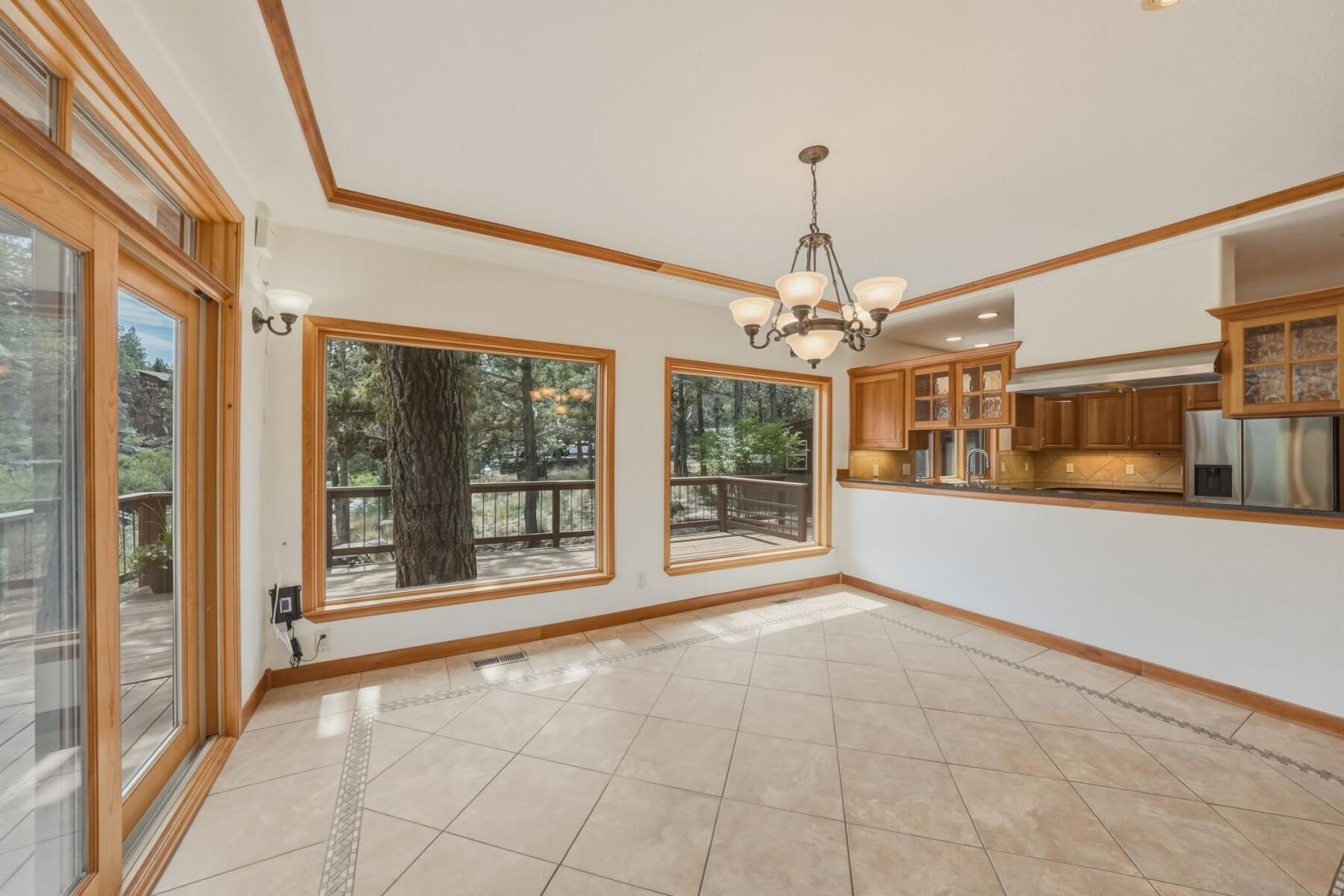 637 Northwest Silver Buckle Road Bend, OR 97703 - Photo 13 of 68 a view of an empty room with window
