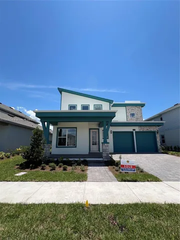 a front view of a house with yard