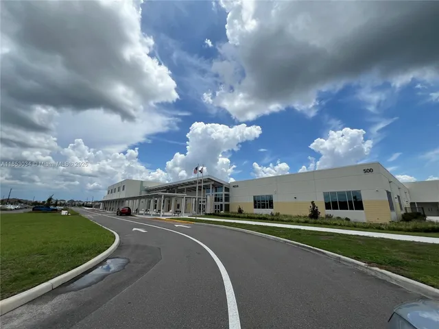 a view of a big yard next to a yard