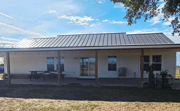 a view of a house with a patio