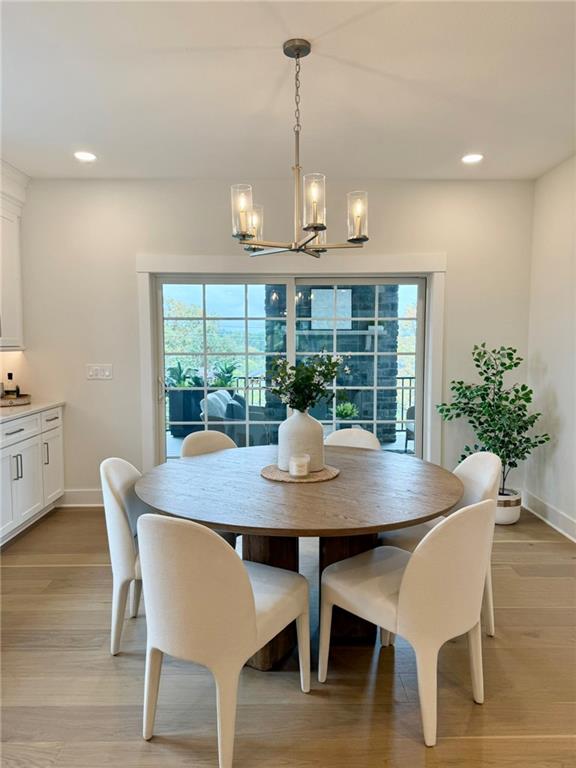 3028 Greeneview Lane Mars, PA 16046 - Photo 8 of 21 a view of a dining room with furniture window and wooden floor
