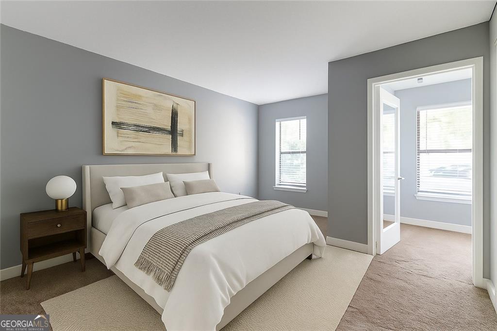 1404 Huntingdon Chase Sandy Springs, GA 30350 - Photo 2 of 5 a bedroom with bed and window