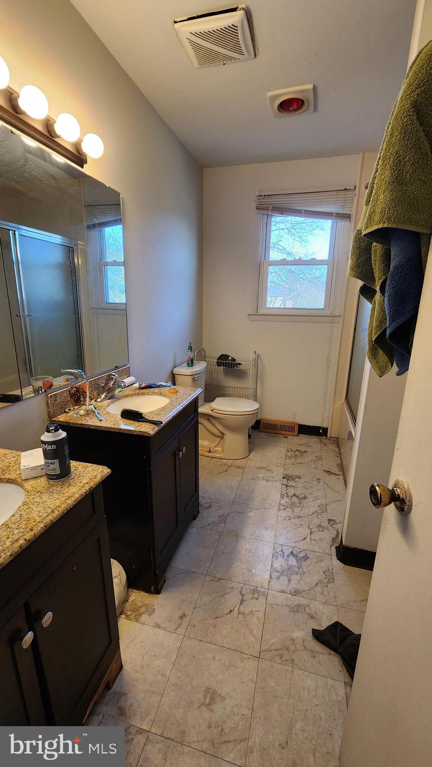 111 A Franklin Road Glassboro, NJ 08028 - Photo 8 of 13 a room with a wooden floor and furniture