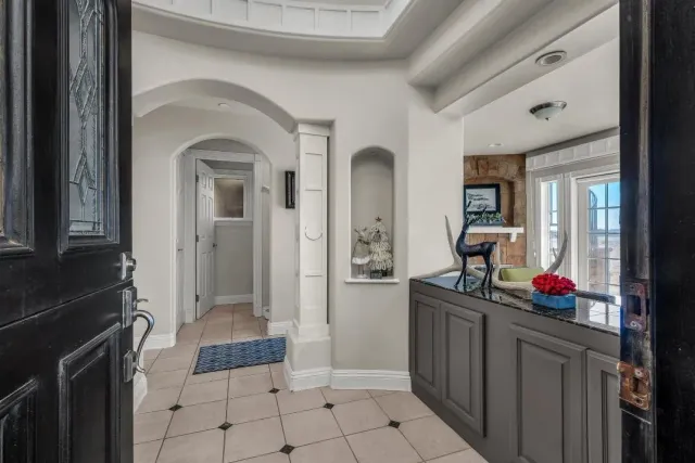 a view of front door and dining room