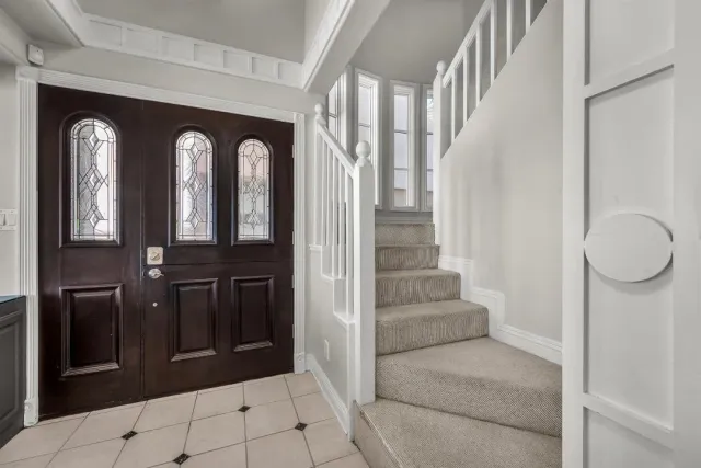 a view of entryway with a front door