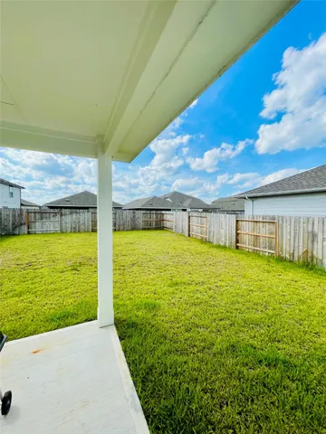 a view of an outdoor space and swimming pool