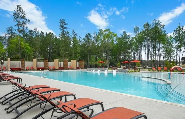 an aerial view of house with yard